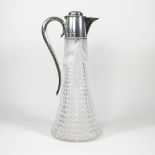An unusually large Victorian cut glass claret jug, of tapered shape, with hobnail cut decoration and