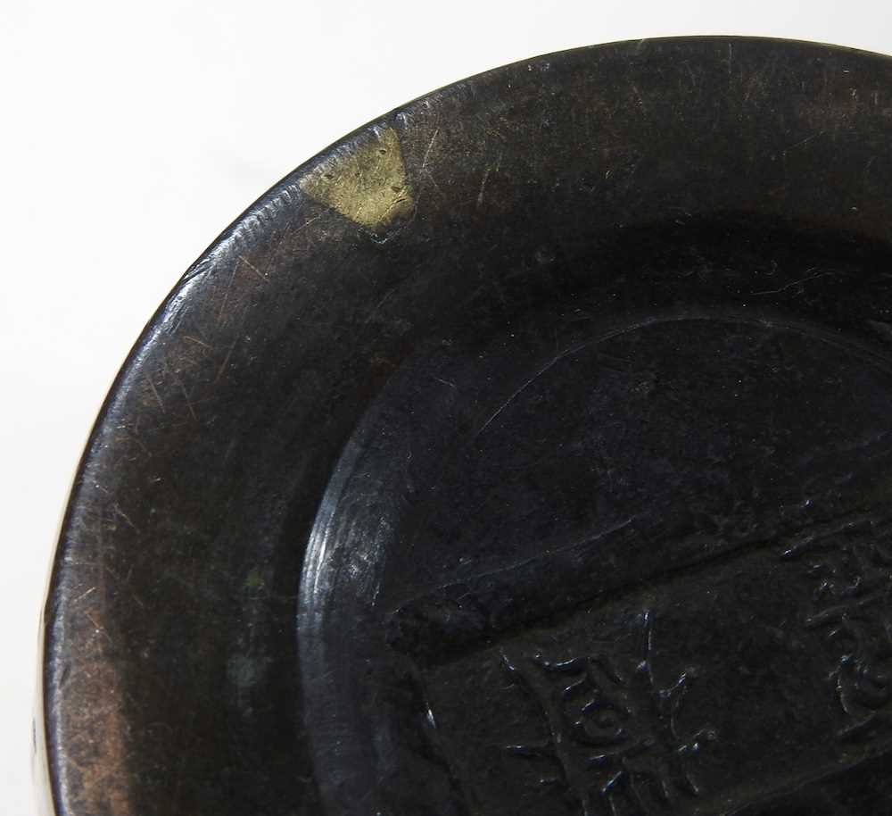 A Chinese bronze beaker, decorated in relief with symbols, signed to base, 13cm high - Image 6 of 7