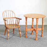 A child's ash and elm windsor style armchair, together with a handmade light oak occasional table (