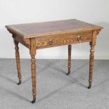 A late 19th century oak writing table, with an inset top, by Waring & Gillows 92w x 58d x 74h cm