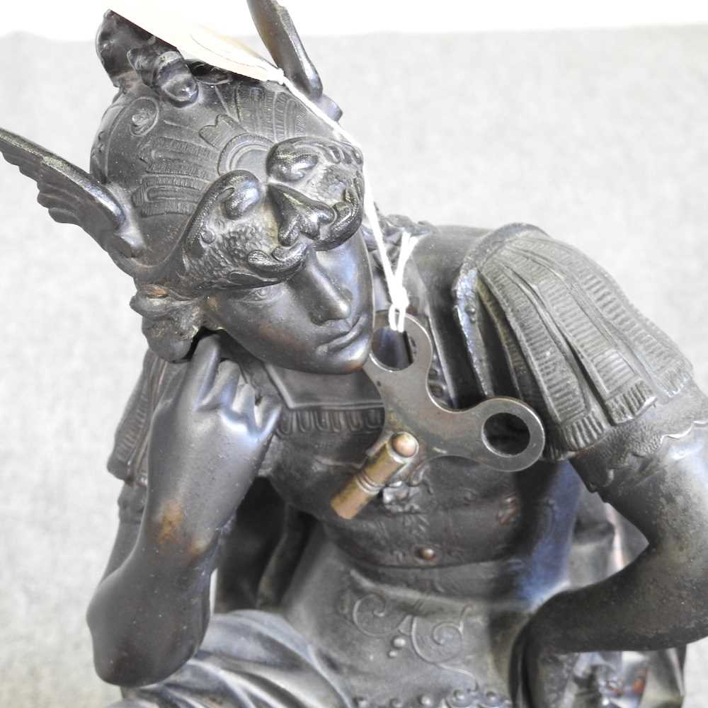 A 19th century gilt spelter figural mantel clock, surmounted by a figure of Hermes, with a white - Image 3 of 9