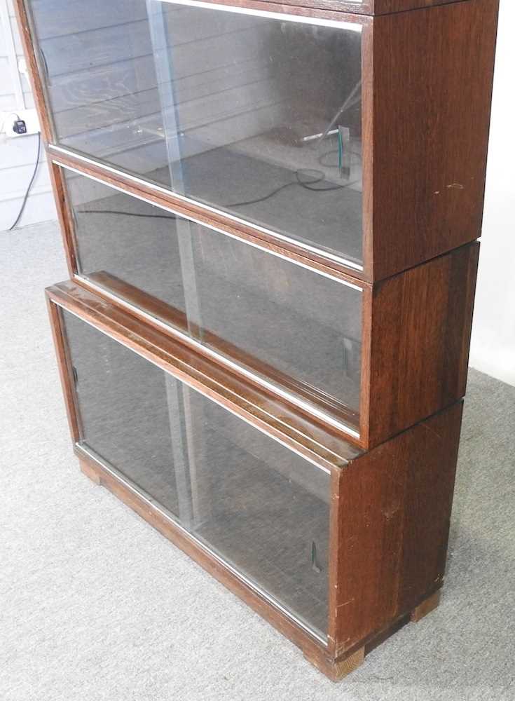 An early 20th century Minty glazed four tier sectional bookcase, enclosed by sliding glazed doors - Image 3 of 5