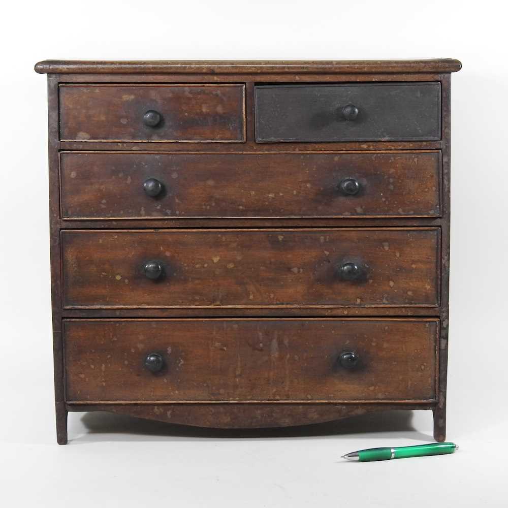 A 19th century mahogany apprentice chest, containing two short over three long drawers 46w x 24d x