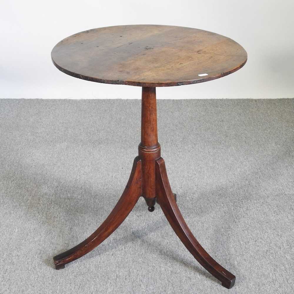 A 19th century walnut occasional table, on a splayed base 57w x 72h cm