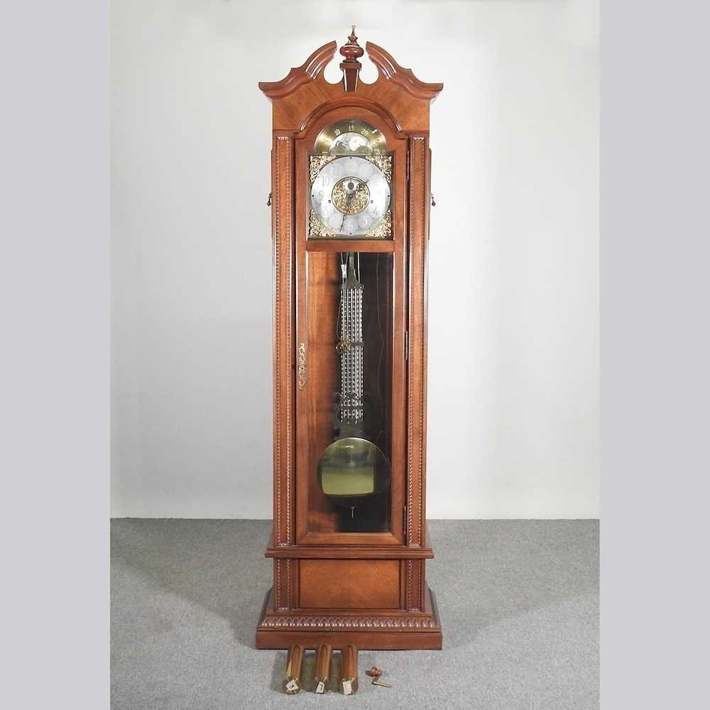A modern teak cased longcase clock, the brass dial signed Hamilton, having a three train movement,