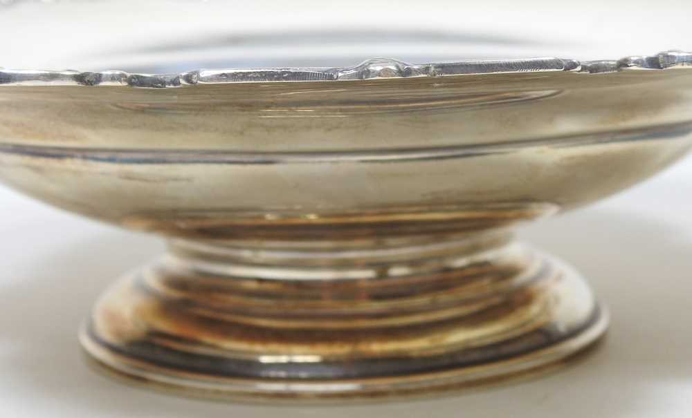 A mid 20th century silver bowl, of circular pedestal form, with a shaped rim, by Mappin & Webb, - Image 4 of 7