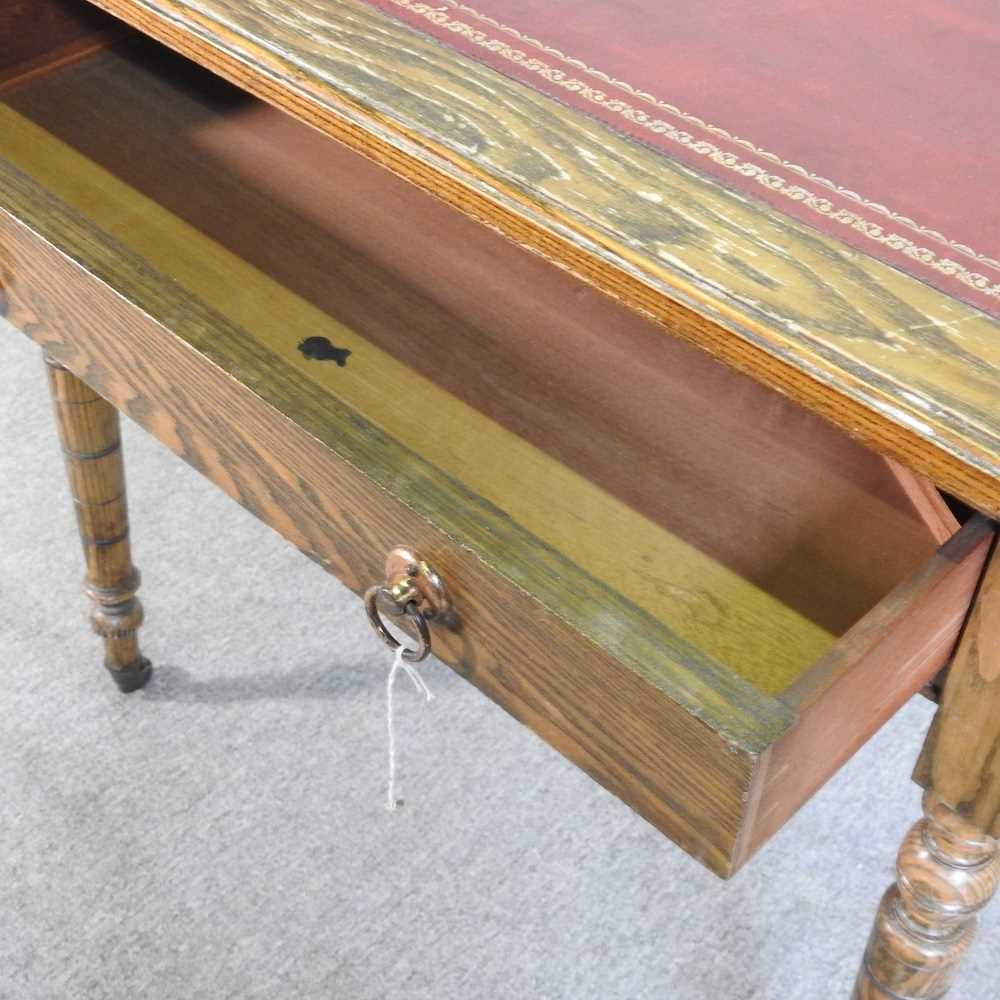 A late 19th century oak writing table, with an inset top, by Waring & Gillows 92w x 58d x 74h cm - Image 6 of 7