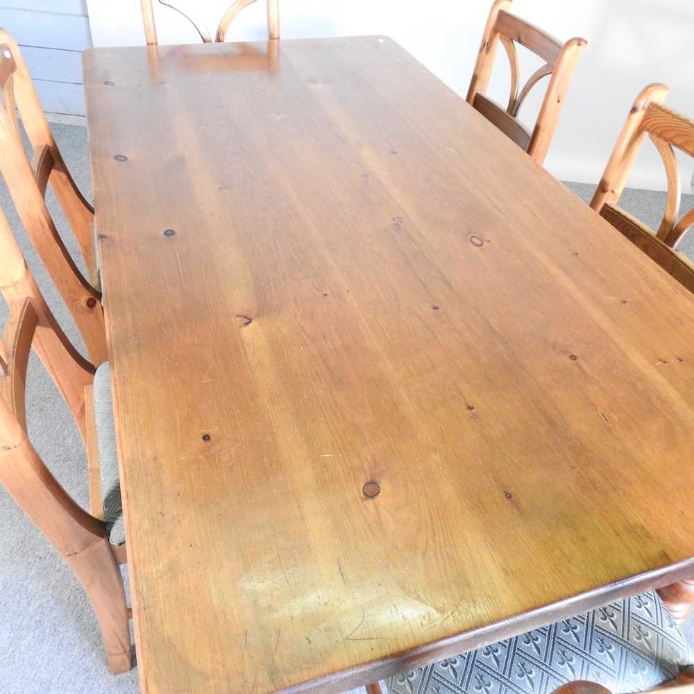 A modern pine dining table, on turned legs, together with a set of six pine dining chairs (7) 183w x - Image 2 of 9