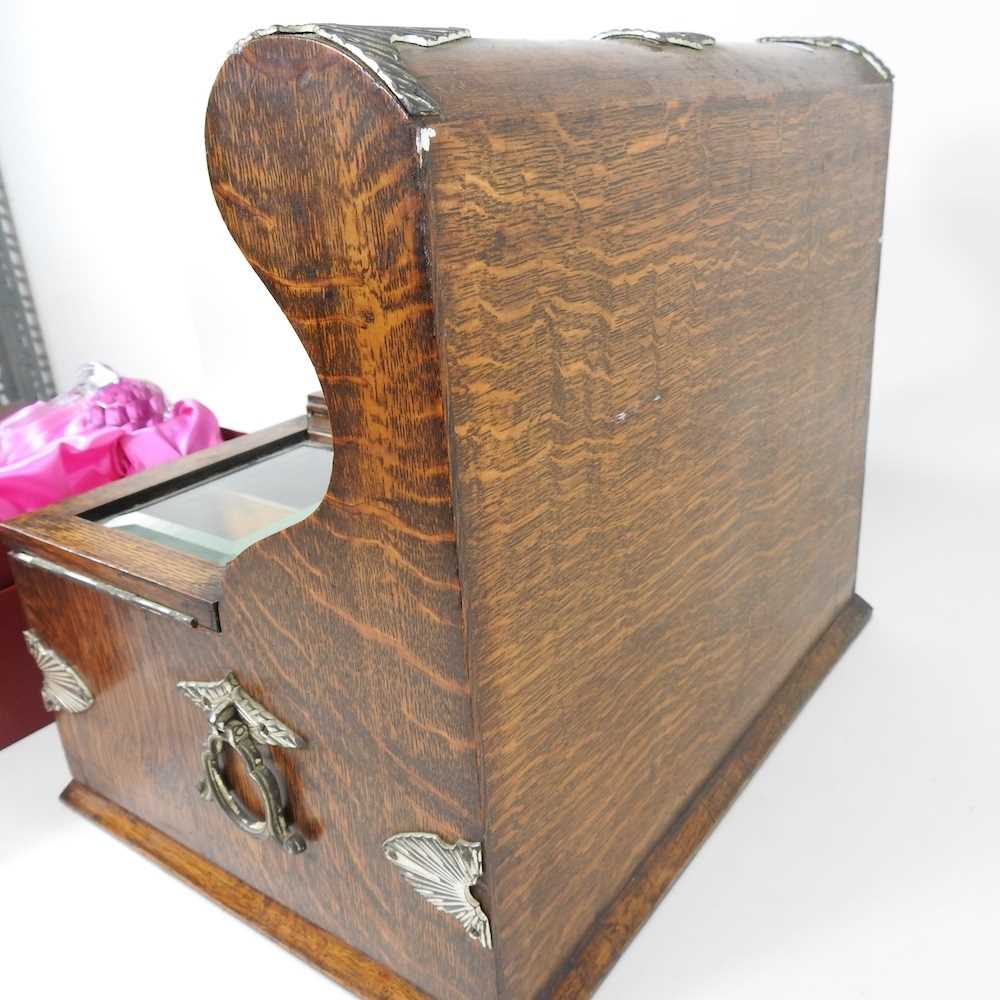 An early 20th century oak three bottle tantalus, with a drawer below, 41cm wide, together with a - Image 2 of 9