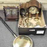 An early 20th century oak tantalus, 24cm wide, together with a 1920's oak cased mantel clock,