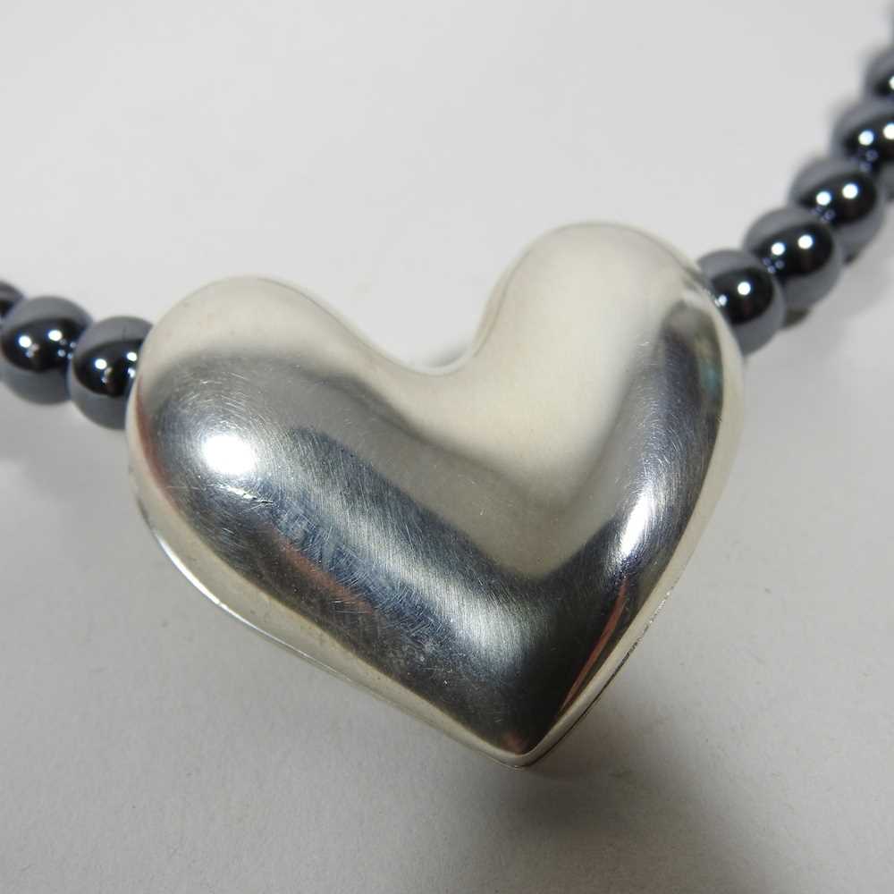 A Georg Jensen silver and hematite bead necklace, suspended with a silver heart shaped pendant, 38mm - Image 5 of 5