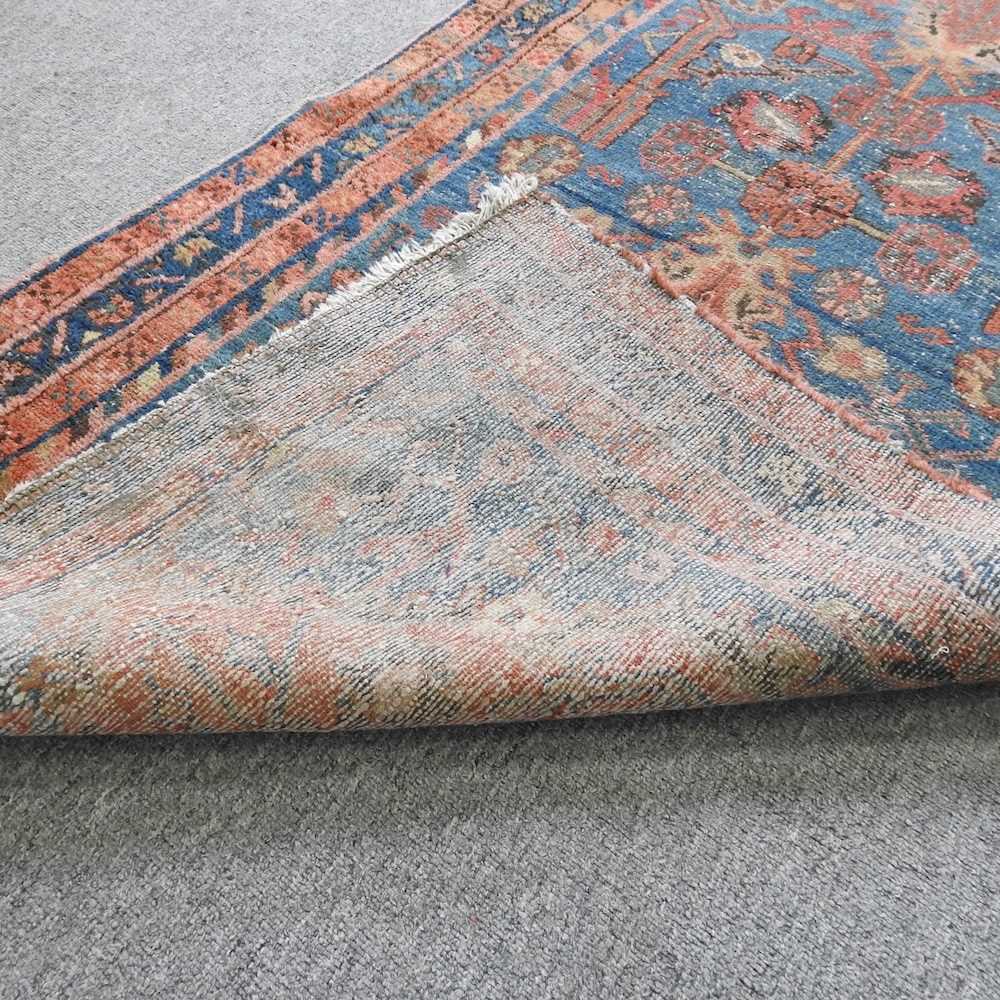 A malayer runner, with flowerhead designs, on a blue ground, 237 x 96cm - Image 4 of 5