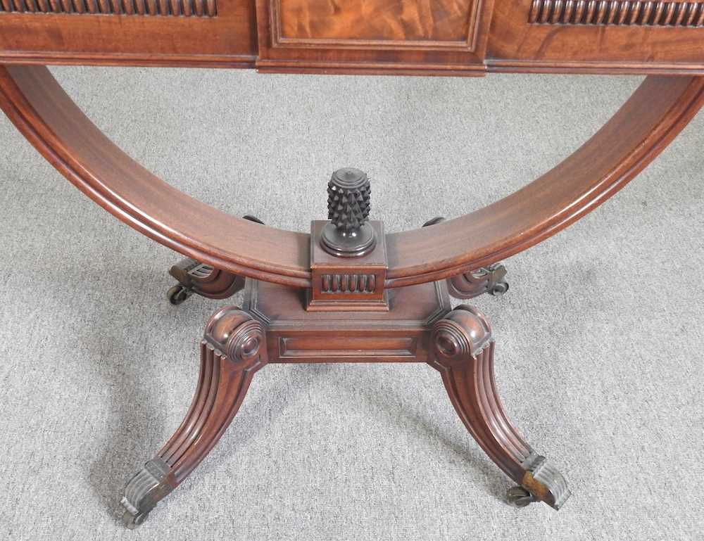 An unusual 19th century mahogany folding tea table, with a hinged rectangular top, on a carved U - Image 3 of 5