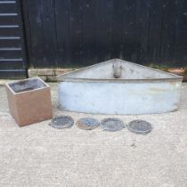 A galvanised corner trough, together with a planter and four trivets 118w x 66d x 37h cm