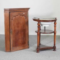 A George III oak hanging corner cabinet, 75cm wide, together with a washstand (2)