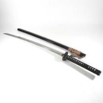 A modern Japanese sword, with a curved blade and bound grip, in scabbard, 104cm long Overall
