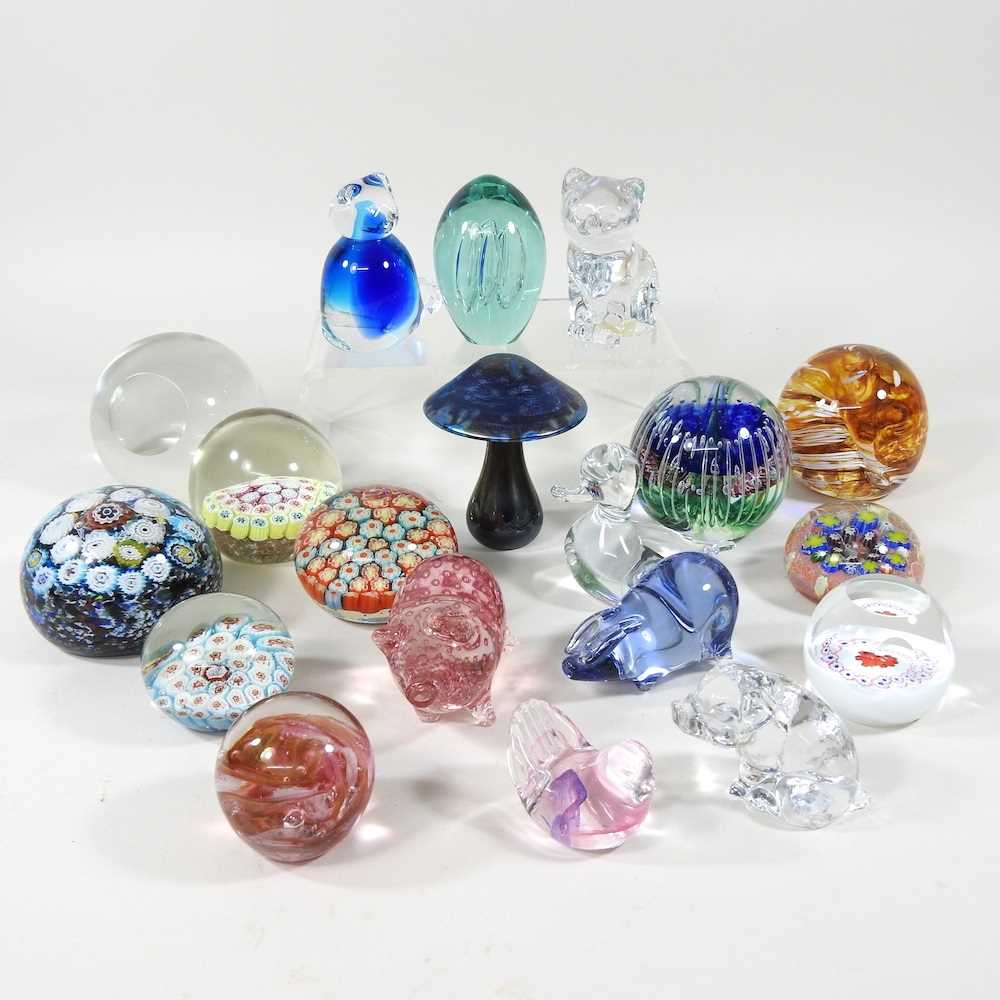 A collection of various glass paperweights, to include millefiori and glass animals