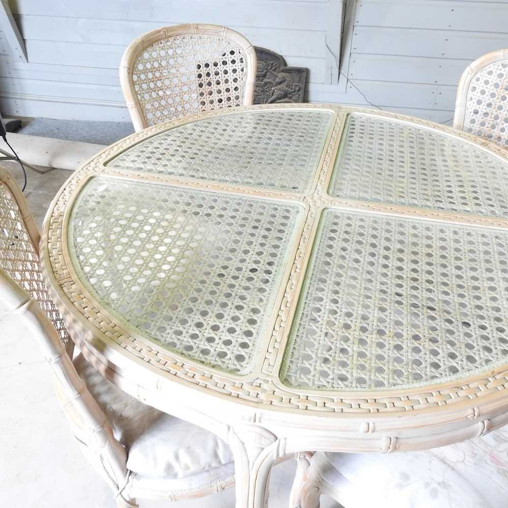 A carved wood and limed dining table, with a glass top, 107cm diameter, together with a set of - Image 4 of 4