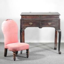 An 18th century clerk's desk, with a hinged sloping fall, together with a Victorian peach