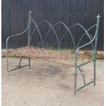 A Regency style iron garden bench, of gothic design 135w x 51d x 105h cm