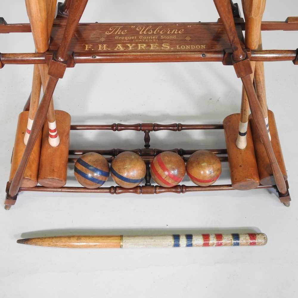 A mid 20th century F.H. Ayers, London wooden The Usborne patent Croquet Carrier Stand, with four - Image 10 of 14