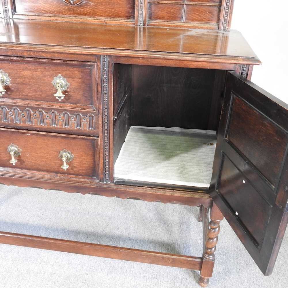 A 1920's Jacobean revival oak sideboard, on spirally turned legs 137w x 48d x115h cm - Image 6 of 7