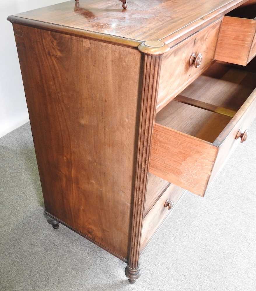 A George III mahogany chest of drawers, 120cm wide, together with a 19th century toiletry mirror (2) - Image 5 of 6