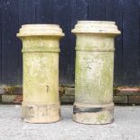 A Doulton terracotta chimney pot, 74cm high, together with another (2)