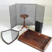 A 19th century mahogany butler's tray, together with a shield shaped wall mirror, a fire screen, a