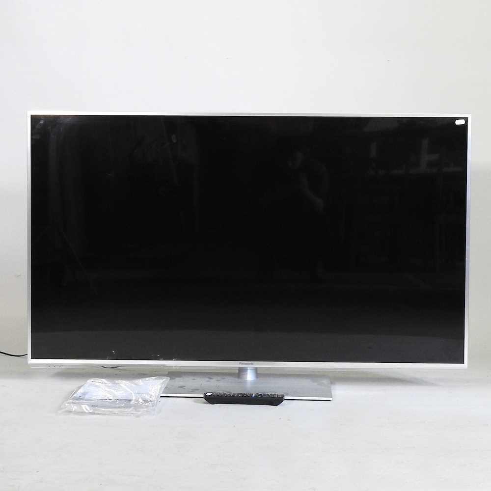 A Panasonic 55inch flat screen LCD television, with remote control This was removed from a house