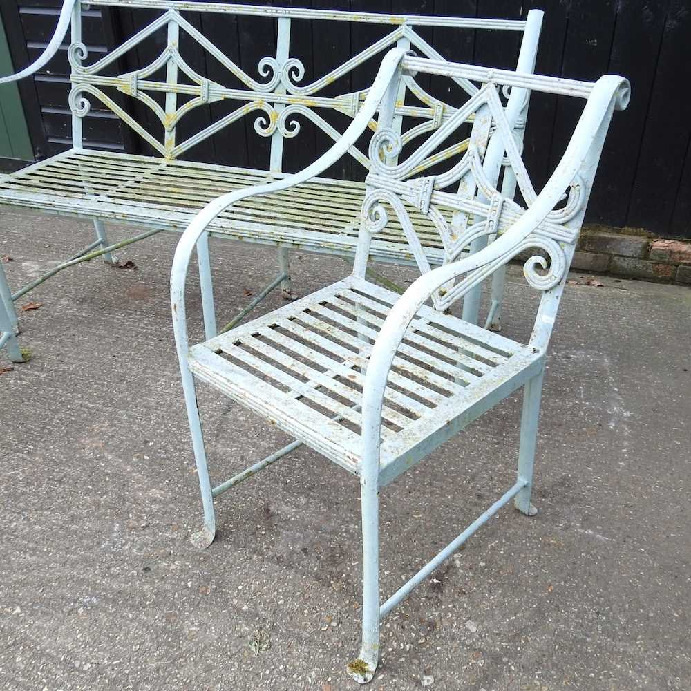 A Regency style cast iron garden set, with a strapwork back, comprising a bench and a pair of - Image 3 of 5