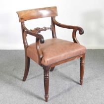 A Regency bar back elbow chair, on turned legs Overall condition is complete and usable. There are