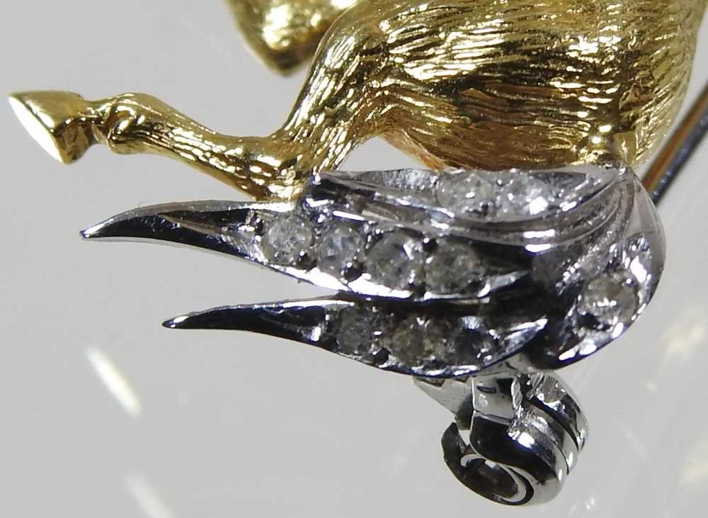 An 18 carat gold brooch, in the form of a horse, with a diamond set mane and tail, having a pin - Image 3 of 7