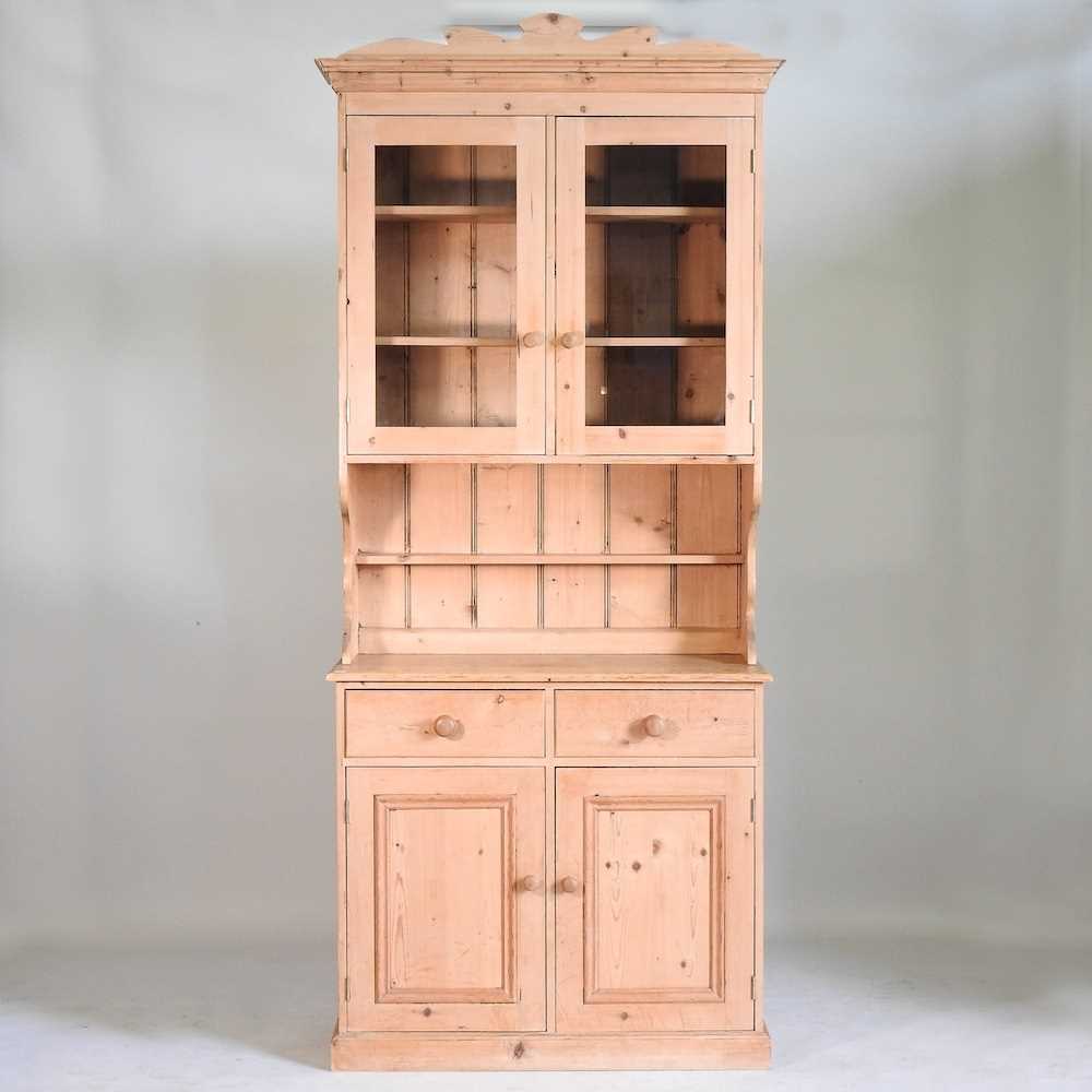 A pine side cabinet, with a glazed upper section, drawers and cupboards below 98w x 44d x 233h cm