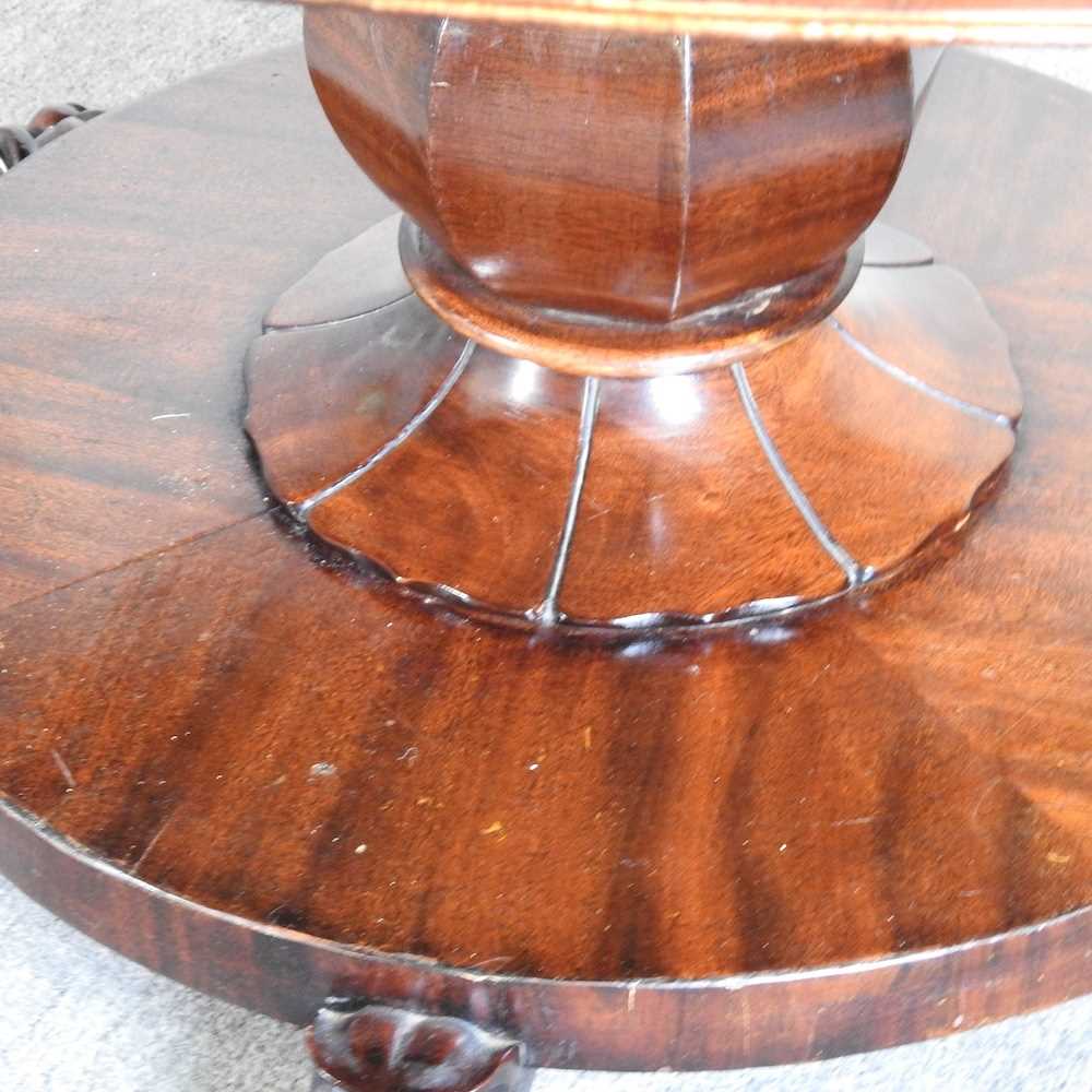 A Victorian hardwood breakfast table, with a hinged circular top, on a platform base 115w x 81h cm - Image 5 of 6