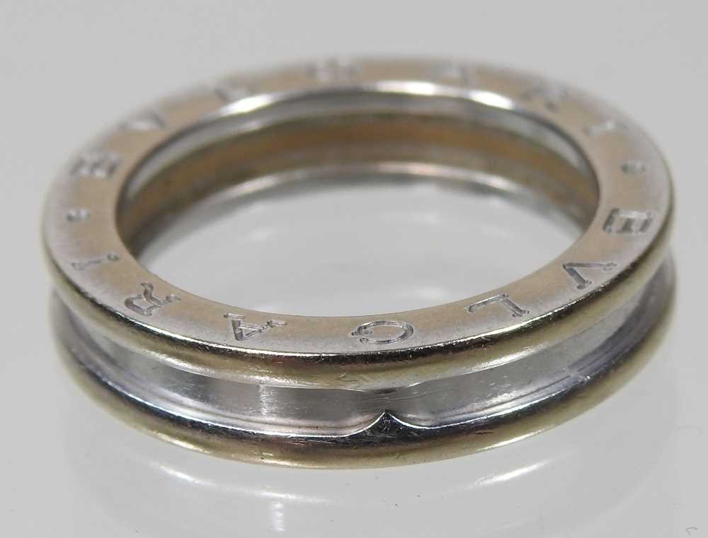 A Bulgari 18 carat white gold ring, of plain ribbed design, inscribed to one side, 5.8g, size P, - Image 4 of 5