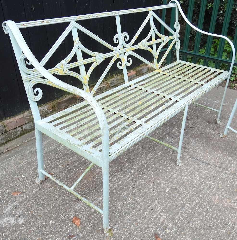 A Regency style cast iron garden set, with a strapwork back, comprising a bench and a pair of - Image 5 of 5