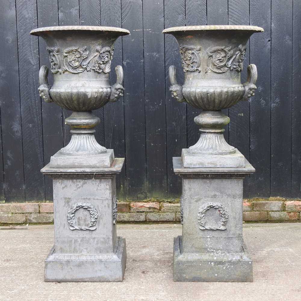 A pair of impressive black painted cast iron garden urns, each of classical design, with an acanthus - Image 5 of 9