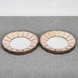 A pair of Art Deco style wall mirrors, of circular shape, 41cm diameter (2)