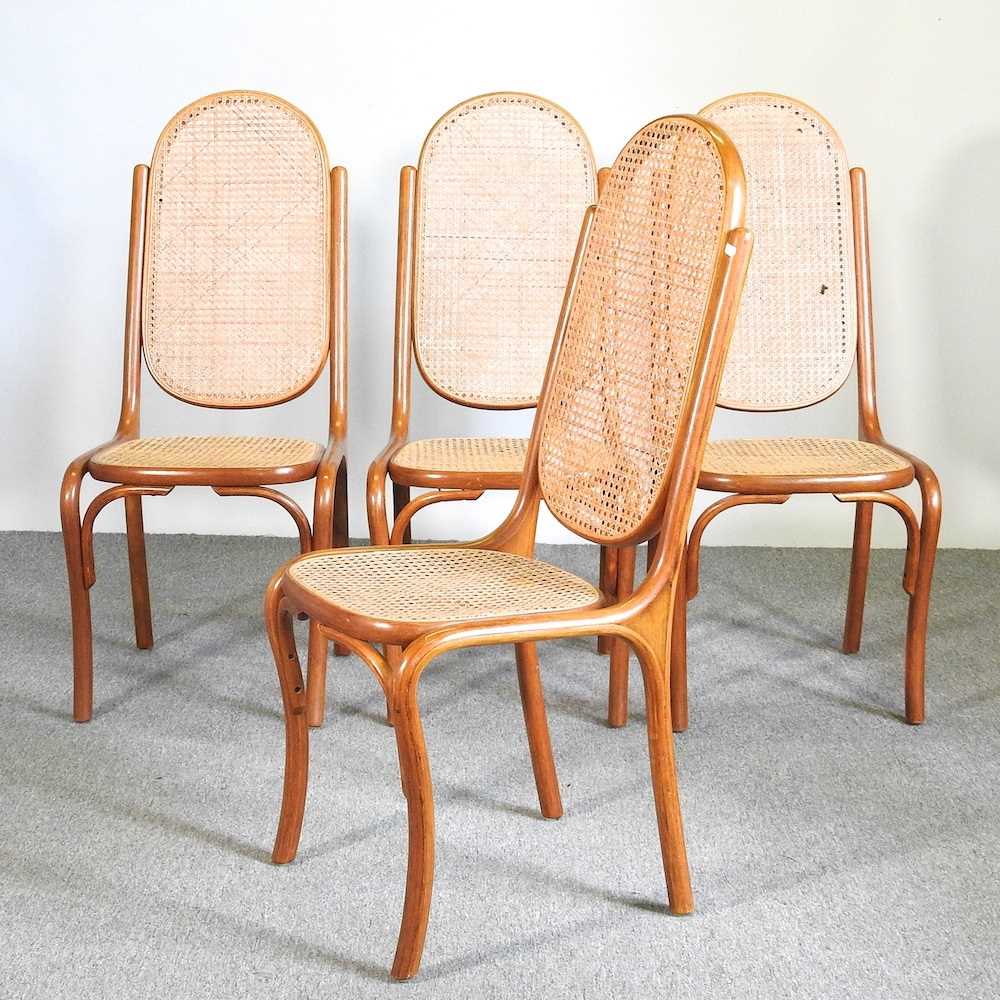 A set of four cane seated bentwood dining chairs (4)