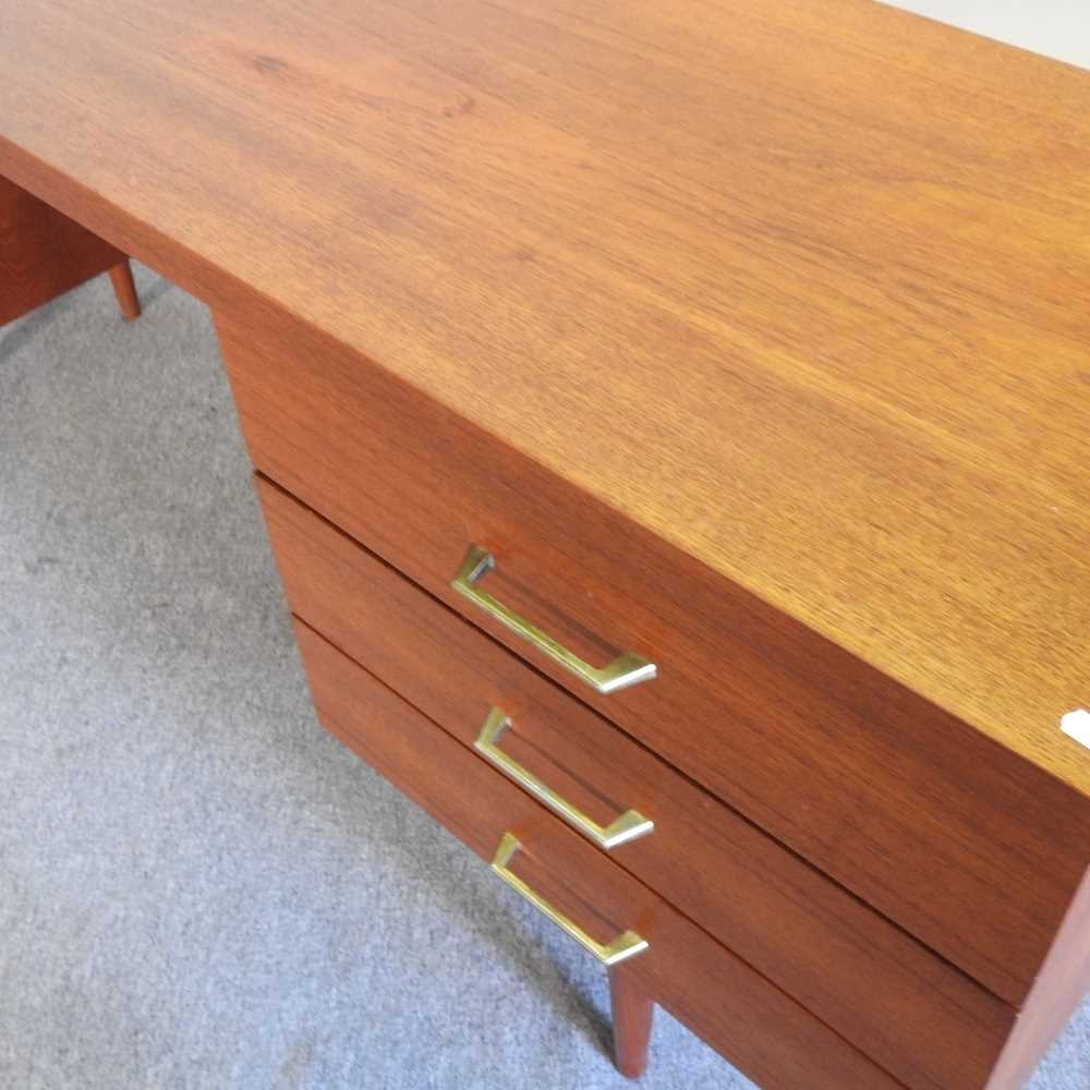 A 1970's teak desk, containing six short drawers 168w x 44d x 70h cm - Image 4 of 6