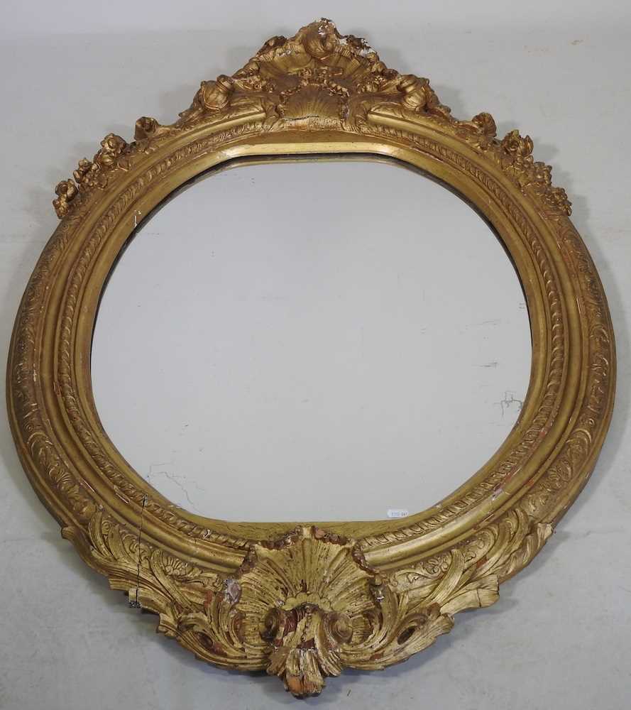A 19th century carved pine and gilt gesso framed wall mirror, of oval shaped, with an acanthus - Image 2 of 14