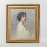 L Burwood, early 20th century, head and shoulders portrait of a lady, signed and dated 1916, oil