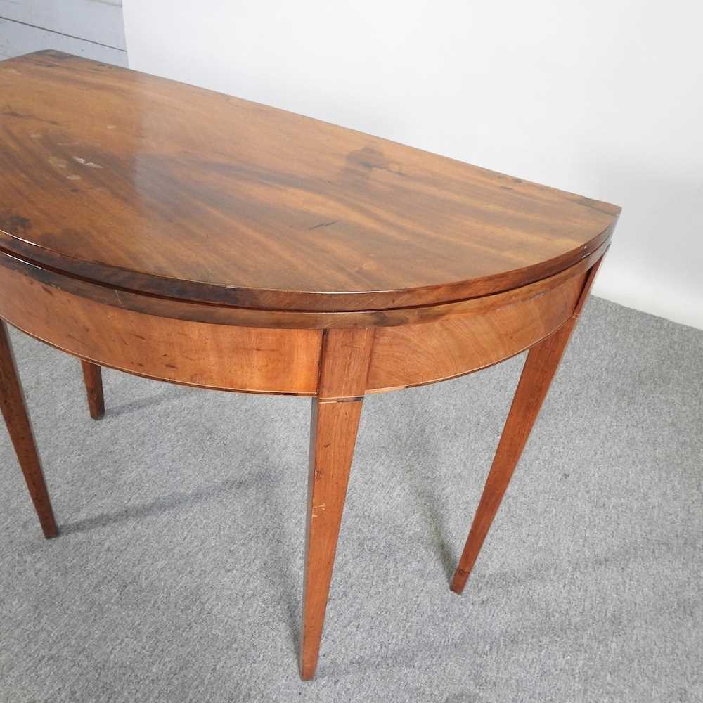 A George III mahogany D shaped folding tea table, on tapered legs 90w x 44d x 74h cm - Image 4 of 5