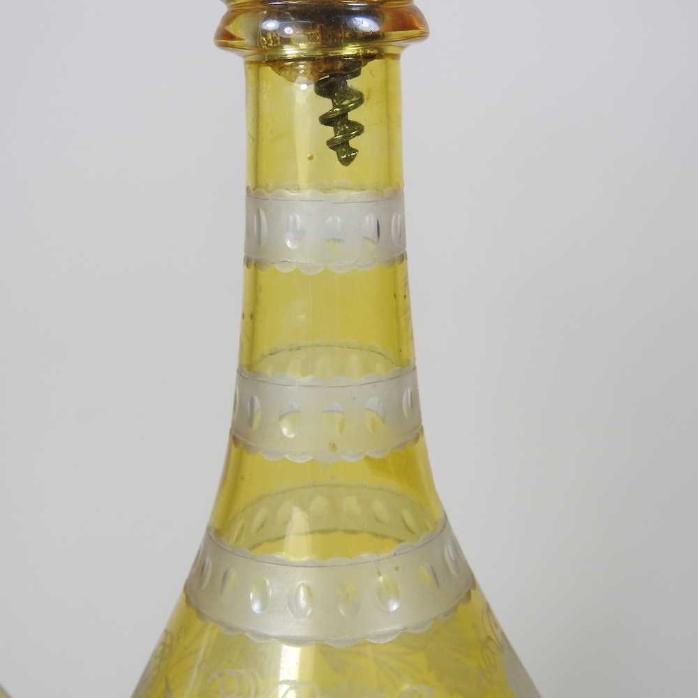 A pair of 19th century yellow overlaid glass wine bottles, each etched with hops, having a silver - Image 3 of 10
