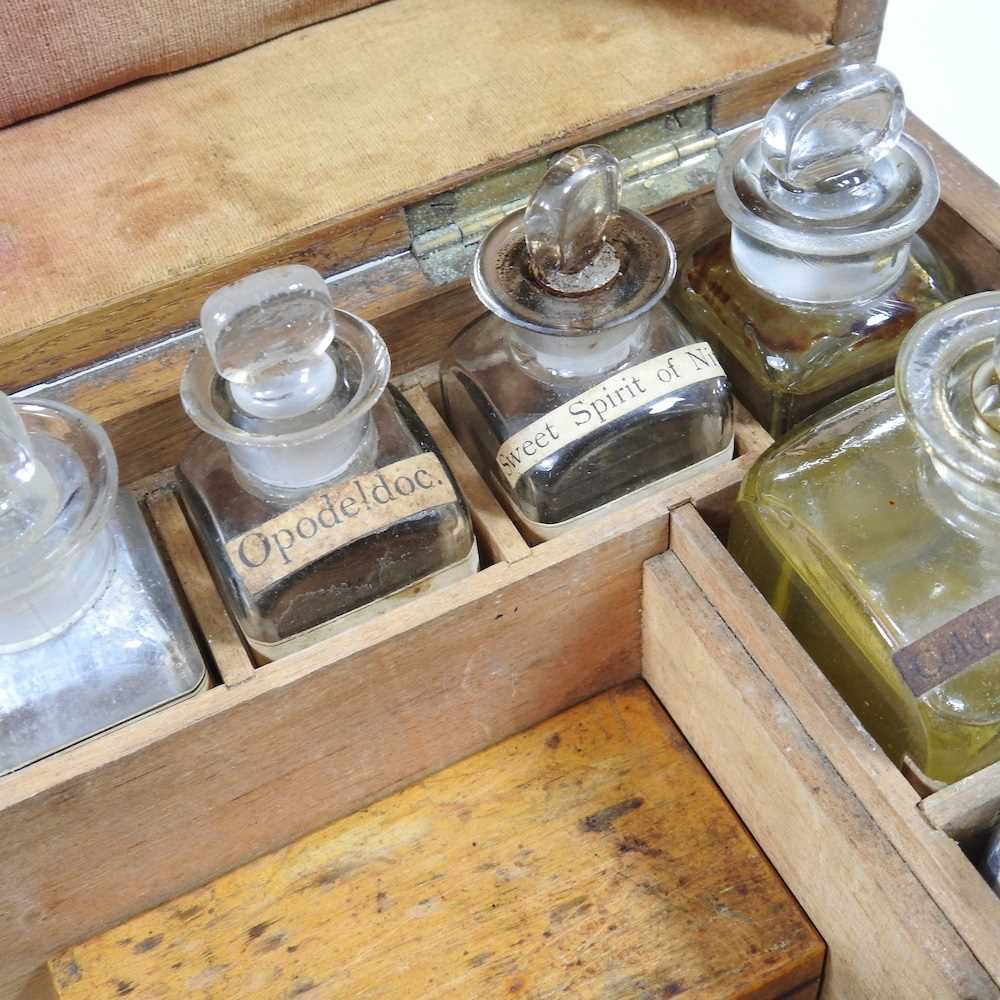 A 19th century oak cased apothecary box, the fitted interior containing labelled glass medicine - Image 8 of 13