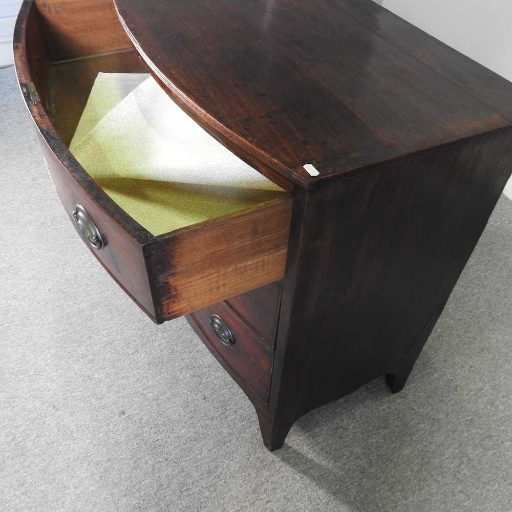 A 19th century mahogany bow front chest, containing three long drawers, on swept bracket feet 93w - Image 3 of 5