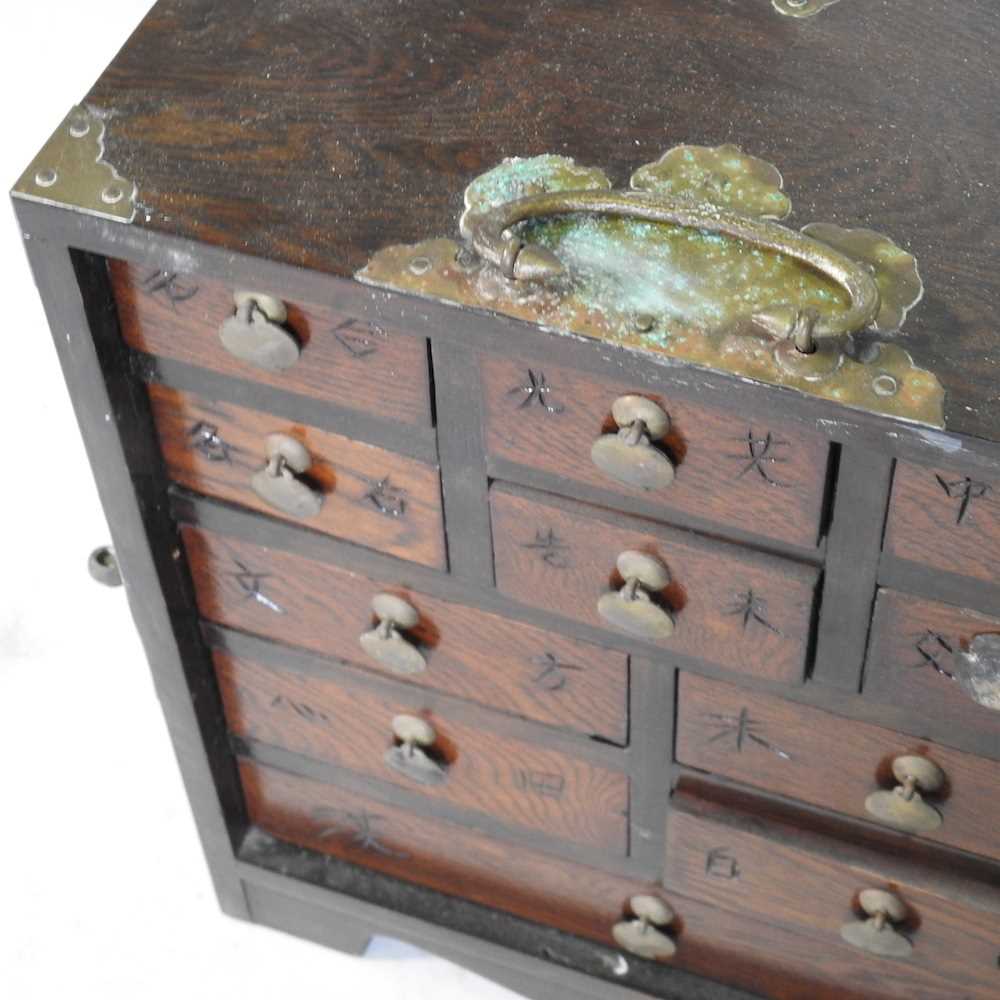 A Chinese elm and brass mounted table cabinet, mid 20th century, containing short drawers 30w x - Image 3 of 5