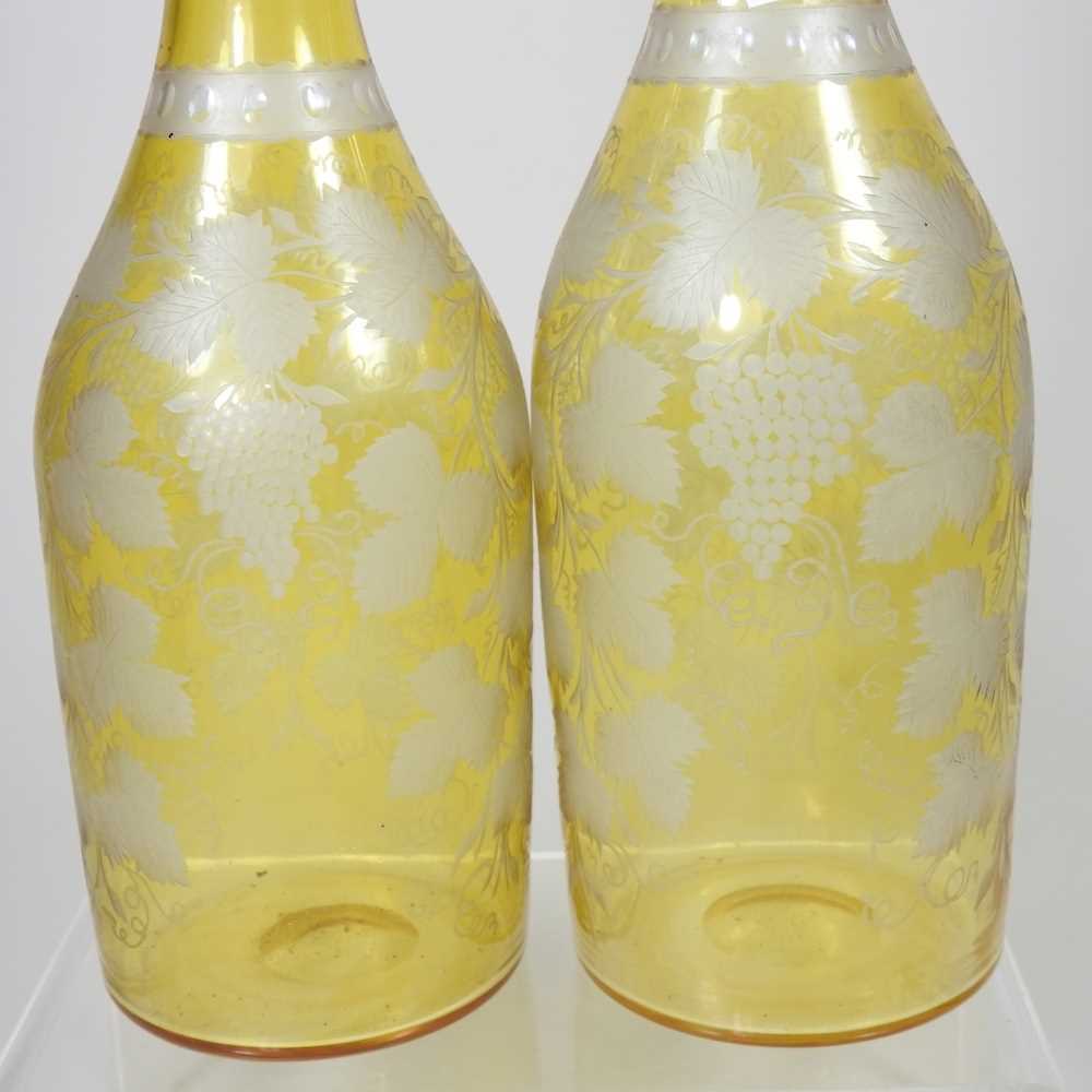 A pair of 19th century yellow overlaid glass wine bottles, each etched with hops, having a silver - Image 7 of 10