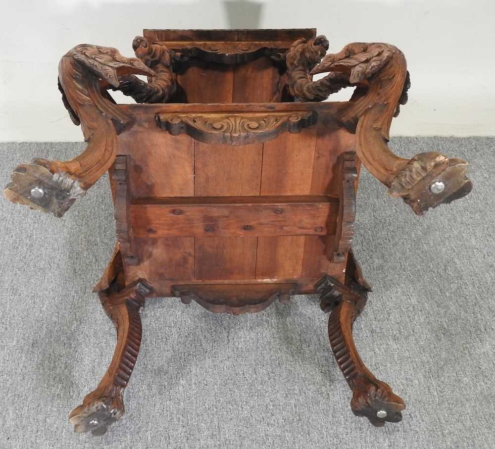 An early 20th century Italian carved walnut centre table, of Renaissance revival design, on four - Image 2 of 5